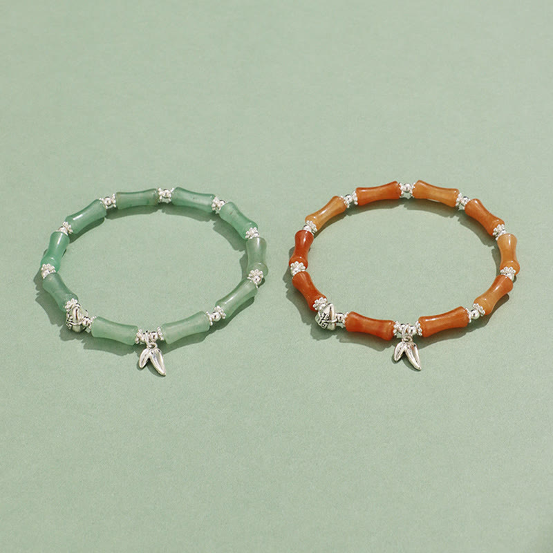 Bracelet porte-bonheur en Buddha Stones, péridot, jade blanc, quartz fraise, aventurine verte, bambou, personnage Fu