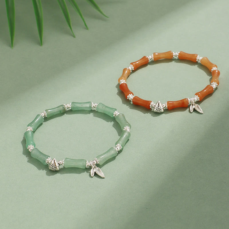 Bracelet porte-bonheur en Buddha Stones, péridot, jade blanc, quartz fraise, aventurine verte, bambou, personnage Fu