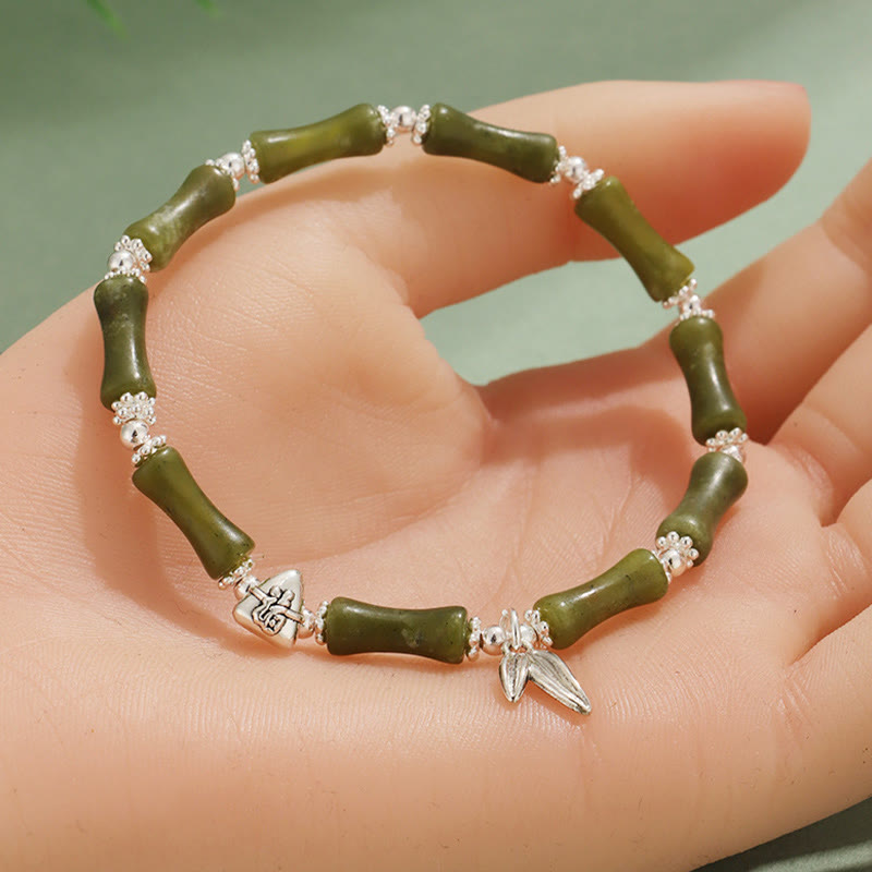 Bracelet porte-bonheur en Buddha Stones, péridot, jade blanc, quartz fraise, aventurine verte, bambou, personnage Fu