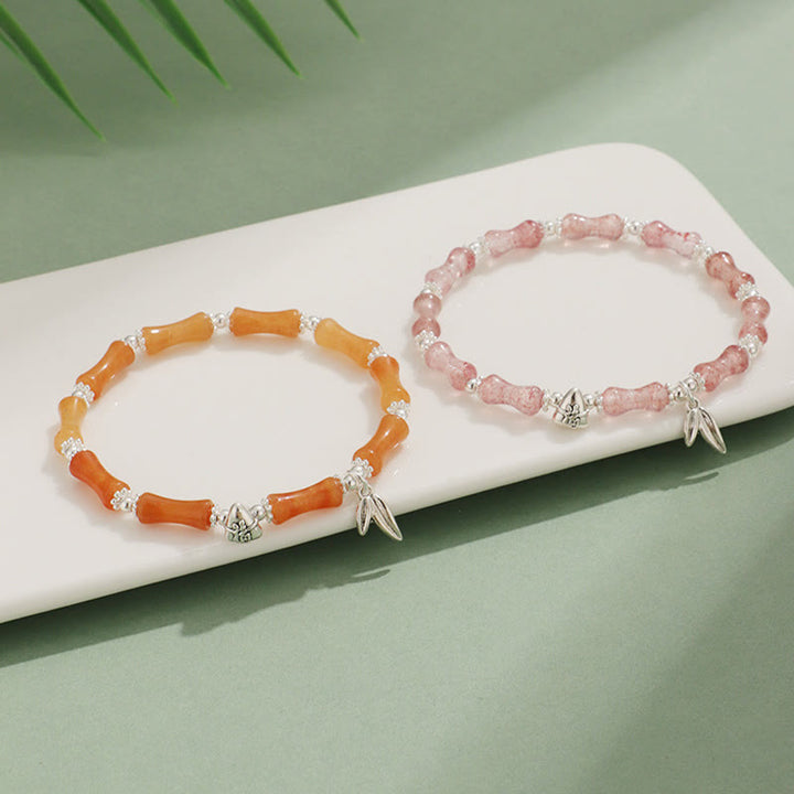 Bracelet porte-bonheur en Buddha Stones, péridot, jade blanc, quartz fraise, aventurine verte, bambou, personnage Fu