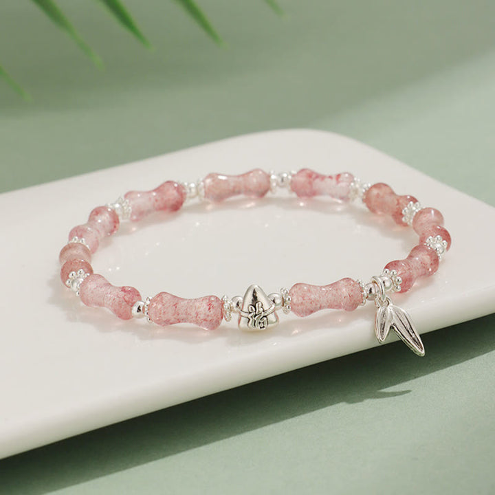 Bracelet porte-bonheur en Buddha Stones, péridot, jade blanc, quartz fraise, aventurine verte, bambou, personnage Fu
