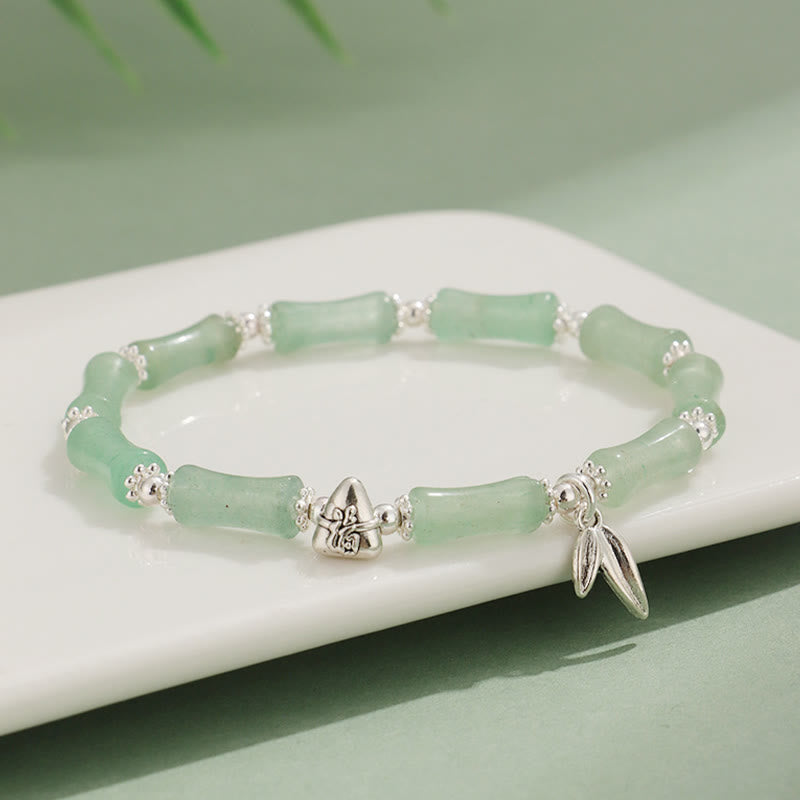 Bracelet porte-bonheur en Buddha Stones, péridot, jade blanc, quartz fraise, aventurine verte, bambou, personnage Fu