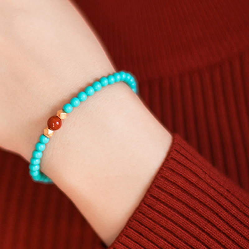 Bracelet de protection en perles d'agate rouge turquoise de Buddha Stones
