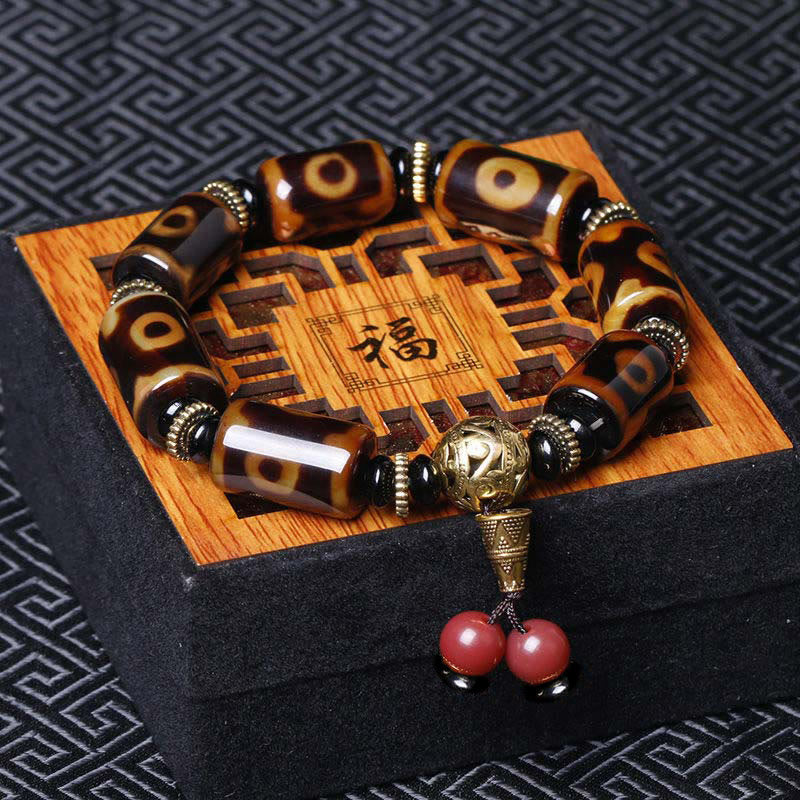 Bracelet porte-bonheur tibétain en perles dzi à neuf yeux Buddha Stones - Perle Dzi à neuf yeux (Tour de poignet : 18-19 cm) - image 0