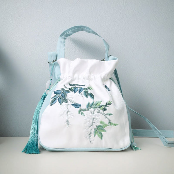 Sac à bandoulière en coton et lin avec fleurs brodées de Buddha Stones et glycine