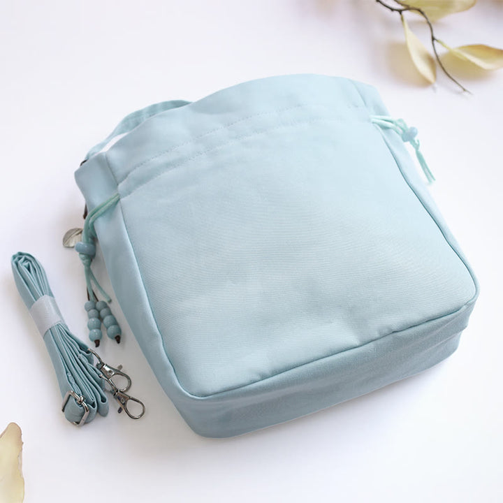 Sac à bandoulière en coton et lin avec fleurs brodées de Buddha Stones et glycine