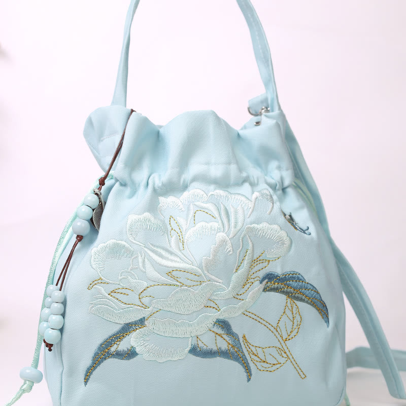 Sac à bandoulière en coton et lin avec fleurs brodées de Buddha Stones et glycine