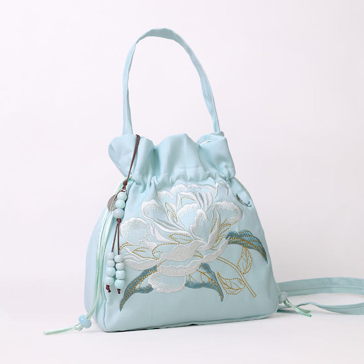 Sac à bandoulière en coton et lin avec fleurs brodées de Buddha Stones et glycine