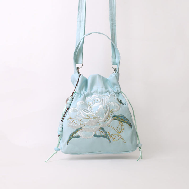 Sac à bandoulière en coton et lin avec fleurs brodées de Buddha Stones et glycine