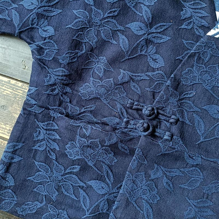 Veste à manches longues et col en V en jacquard avec fleurs et Buddha Stones