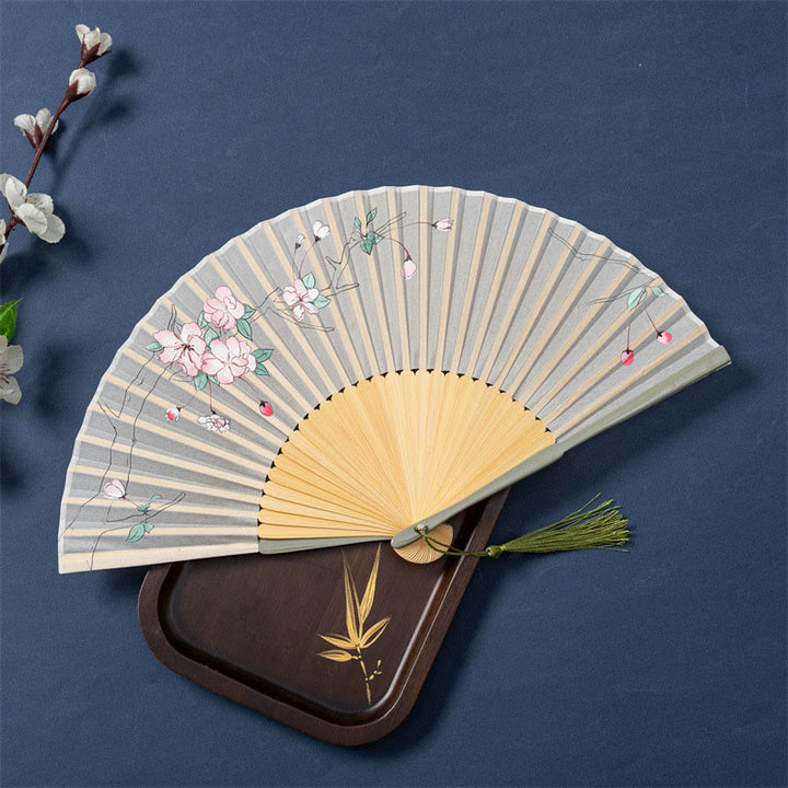 Éventail pliable en bambou avec Buddha Stones de lotus, bégonia, jasmin, 21 cm
