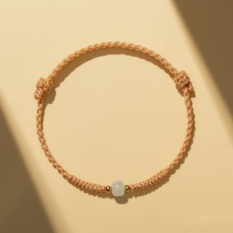 Bracelet tressé en perles de jade porte-bonheur fabriquées à la main par Buddha Stones