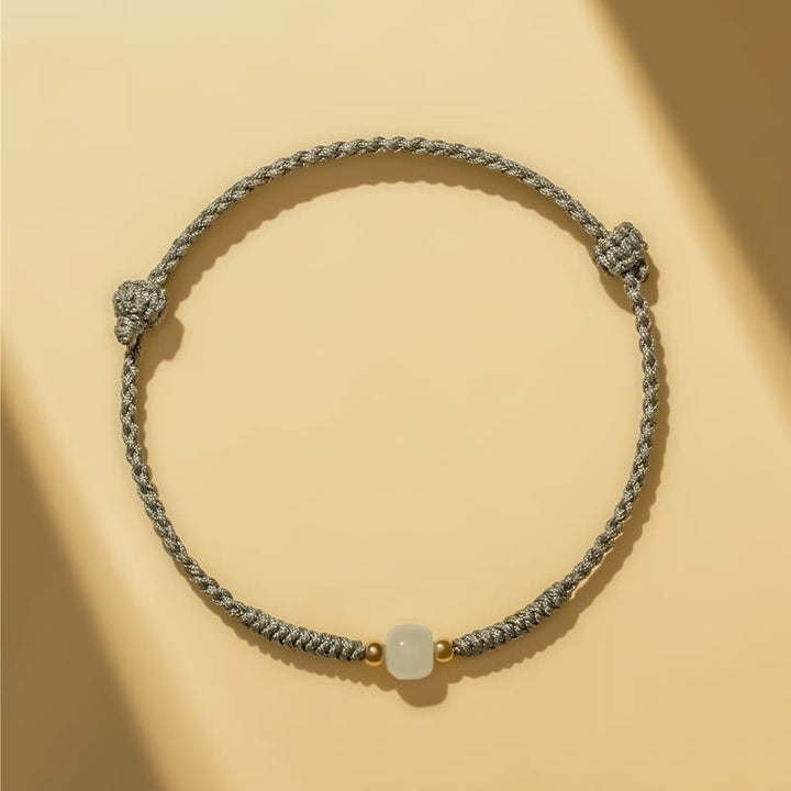 Bracelet tressé en perles de jade porte-bonheur fabriquées à la main par Buddha Stones