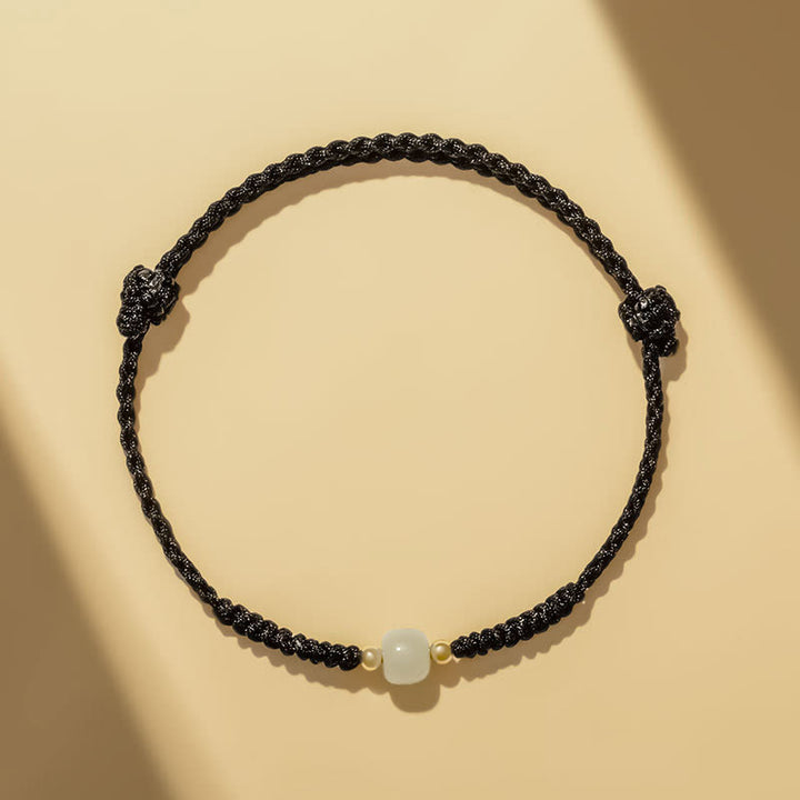 Bracelet tressé en perles de jade porte-bonheur fabriquées à la main par Buddha Stones