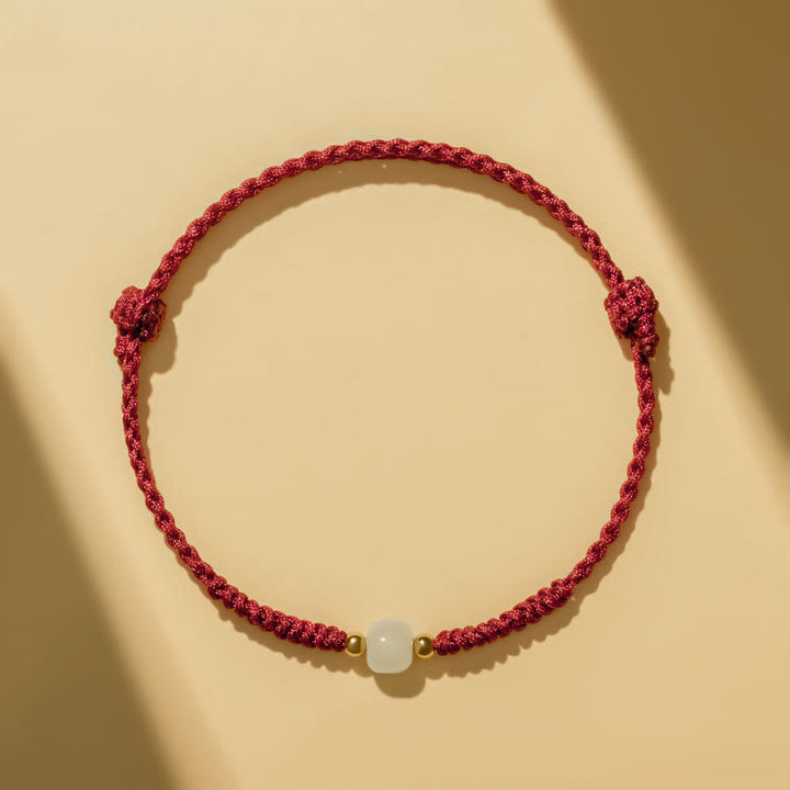 Bracelet tressé en perles de jade porte-bonheur fabriquées à la main par Buddha Stones