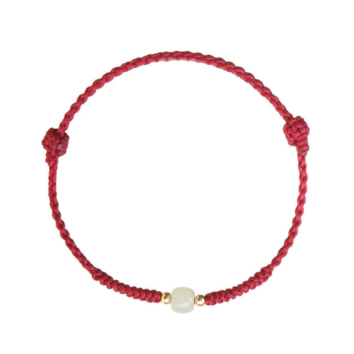 Bracelet tressé en perles de jade porte-bonheur fabriquées à la main par Buddha Stones