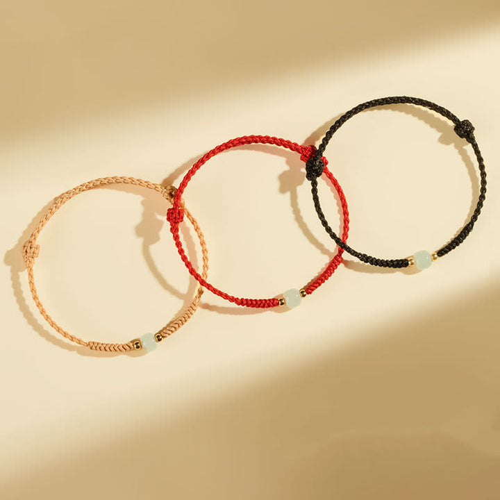Bracelet tressé en perles de jade porte-bonheur fabriquées à la main par Buddha Stones