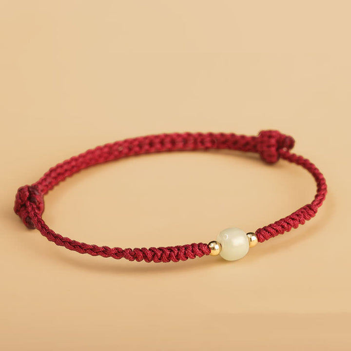 Bracelet tressé en perles de jade porte-bonheur fabriquées à la main par Buddha Stones