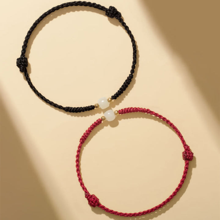 Bracelet tressé en perles de jade porte-bonheur fabriquées à la main par Buddha Stones