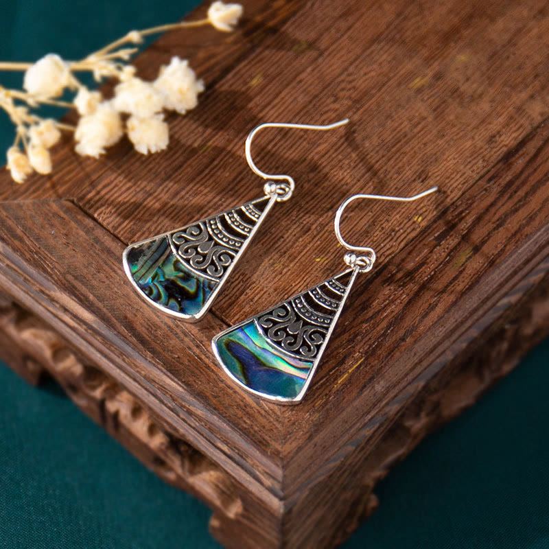 Boucles d'oreilles pendantes en cuivre avec pierre Tridacna et motif creux de Buddha Stones