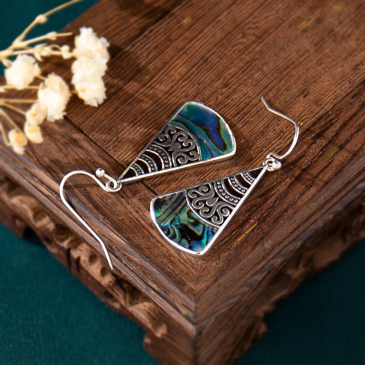Boucles d'oreilles pendantes en cuivre avec pierre Tridacna et motif creux de Buddha Stones