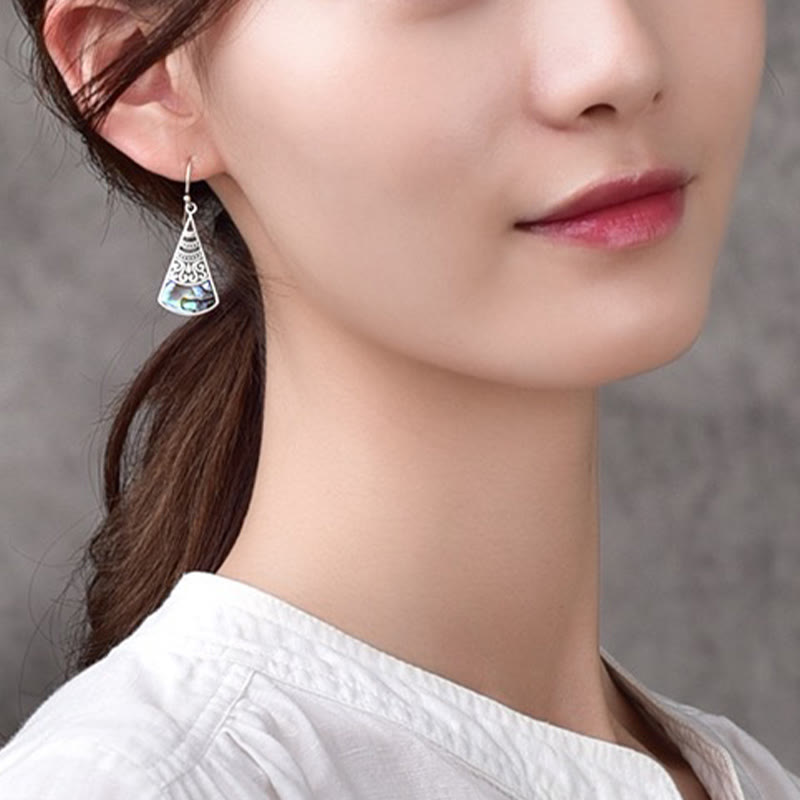 Boucles d'oreilles pendantes en cuivre avec pierre Tridacna et motif creux de Buddha Stones