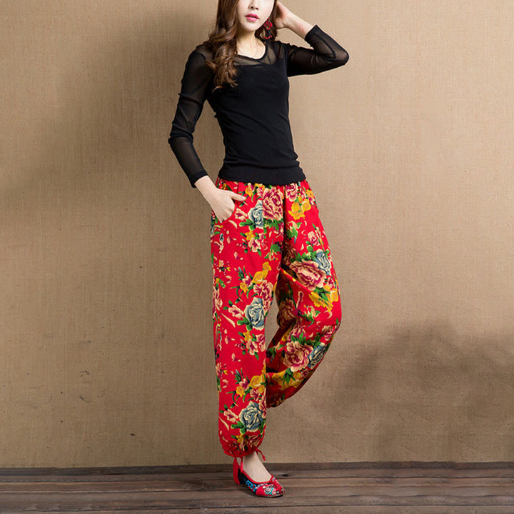 Pantalon sarouel à imprimé fleurs rouges et vertes de style ethnique avec Buddha Stones et poches