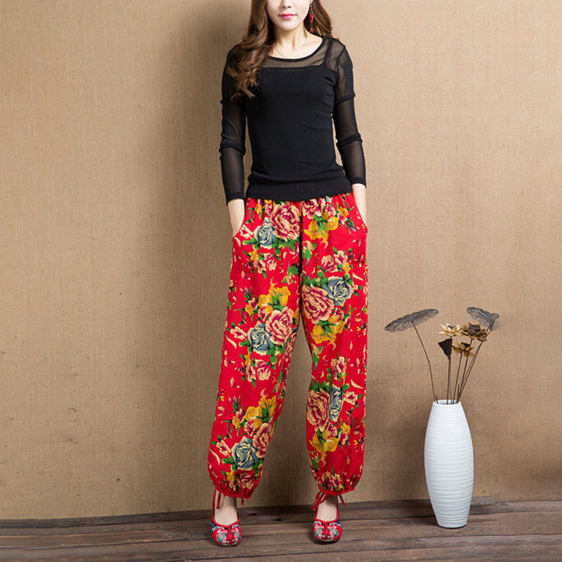 Pantalon sarouel à imprimé fleurs rouges et vertes de style ethnique avec Buddha Stones et poches