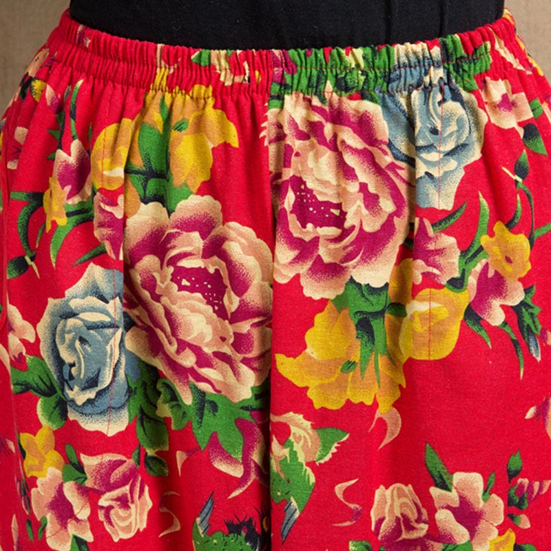 Pantalon sarouel à imprimé fleurs rouges et vertes de style ethnique avec Buddha Stones et poches