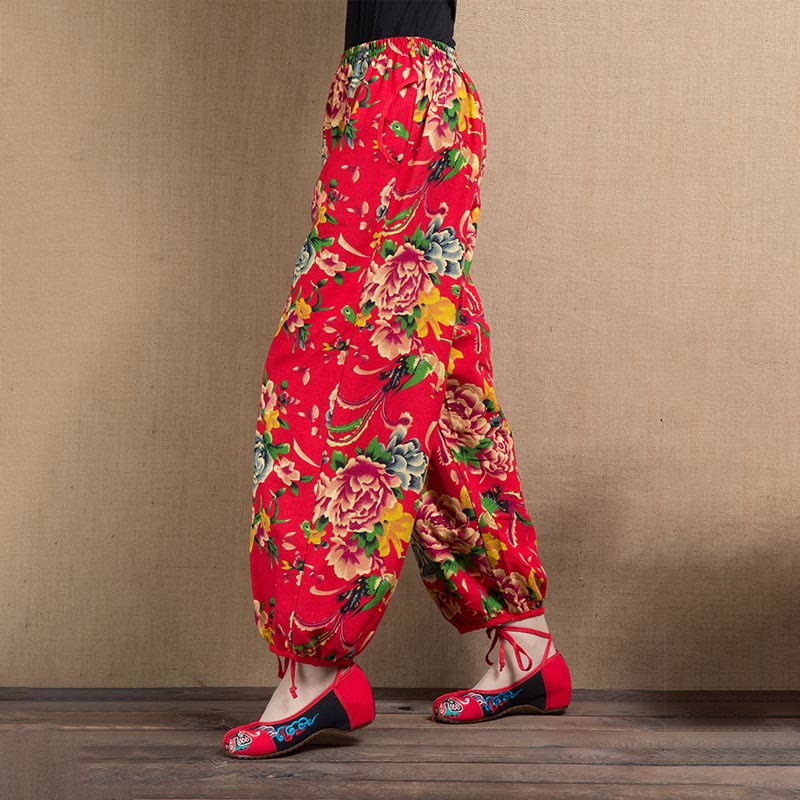 Pantalon sarouel à imprimé fleurs rouges et vertes de style ethnique avec Buddha Stones et poches