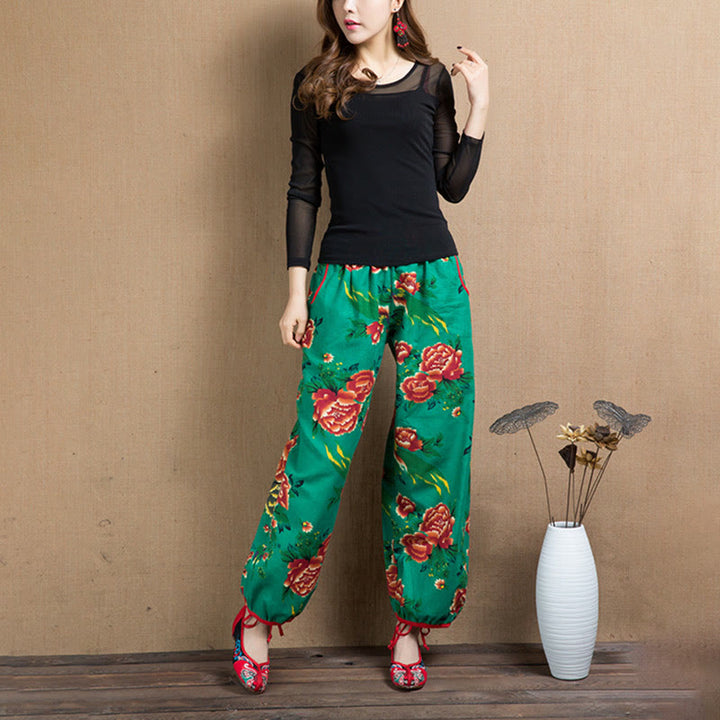 Pantalon sarouel à imprimé fleurs rouges et vertes de style ethnique avec Buddha Stones et poches