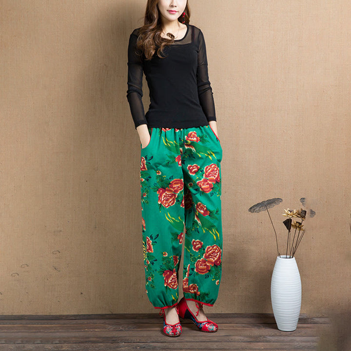 Pantalon sarouel à imprimé fleurs rouges et vertes de style ethnique avec Buddha Stones et poches