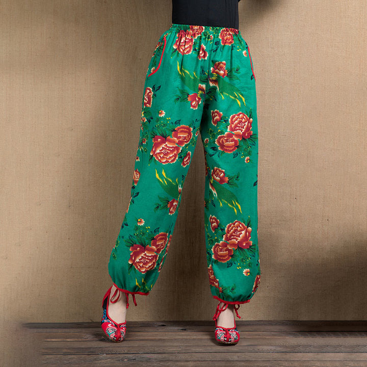 Pantalon sarouel à imprimé fleurs rouges et vertes de style ethnique avec Buddha Stones et poches