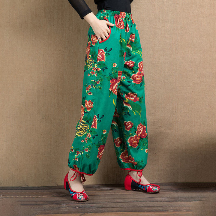 Pantalon sarouel à imprimé fleurs rouges et vertes de style ethnique avec Buddha Stones et poches
