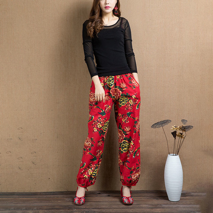 Pantalon sarouel à imprimé fleurs rouges et vertes de style ethnique avec Buddha Stones et poches