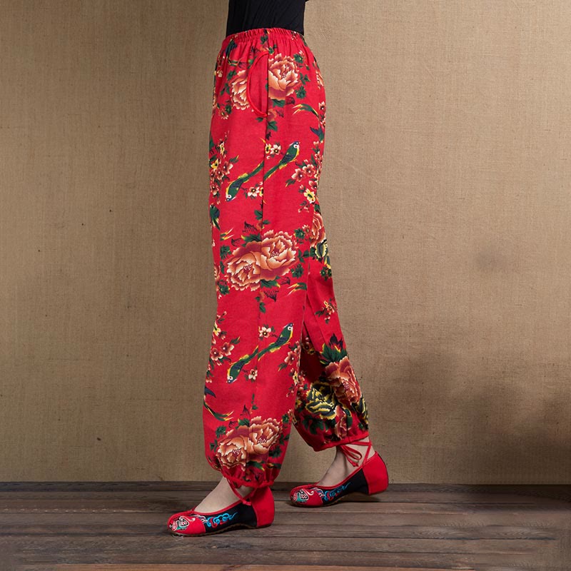 Pantalon sarouel à imprimé fleurs rouges et vertes de style ethnique avec Buddha Stones et poches