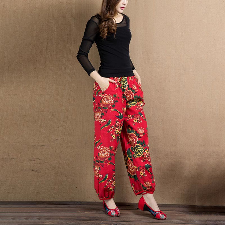 Pantalon sarouel à imprimé fleurs rouges et vertes de style ethnique avec Buddha Stones et poches