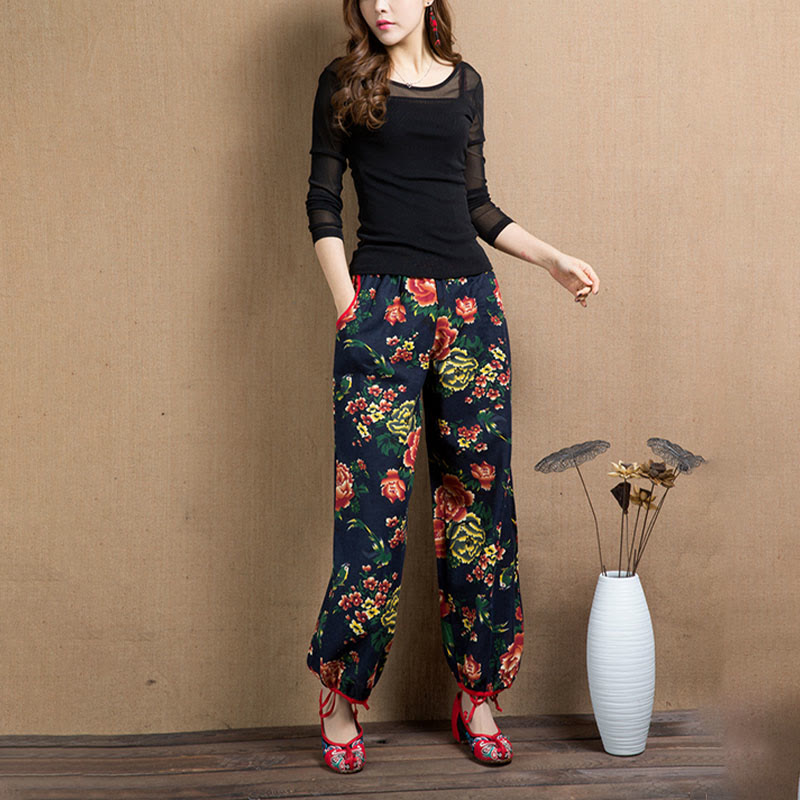 Pantalon sarouel à imprimé fleurs rouges et vertes de style ethnique avec Buddha Stones et poches