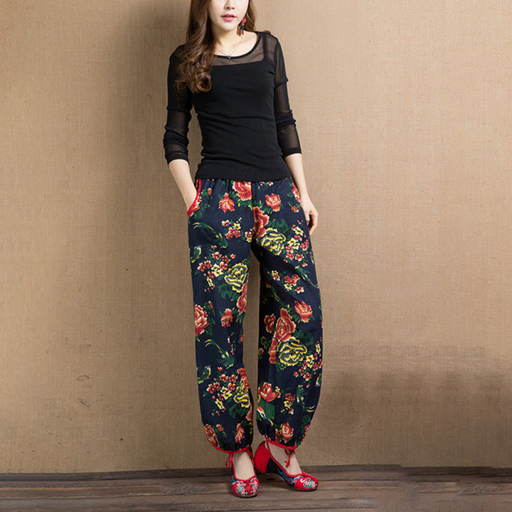 Pantalon sarouel à imprimé fleurs rouges et vertes de style ethnique avec Buddha Stones et poches