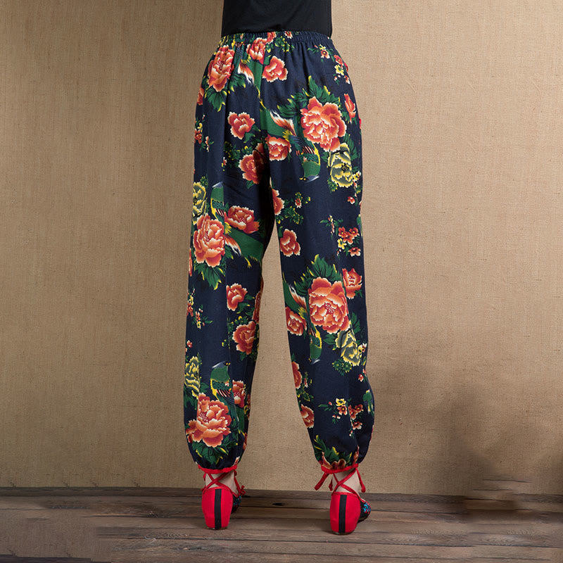 Pantalon sarouel à imprimé fleurs rouges et vertes de style ethnique avec Buddha Stones et poches