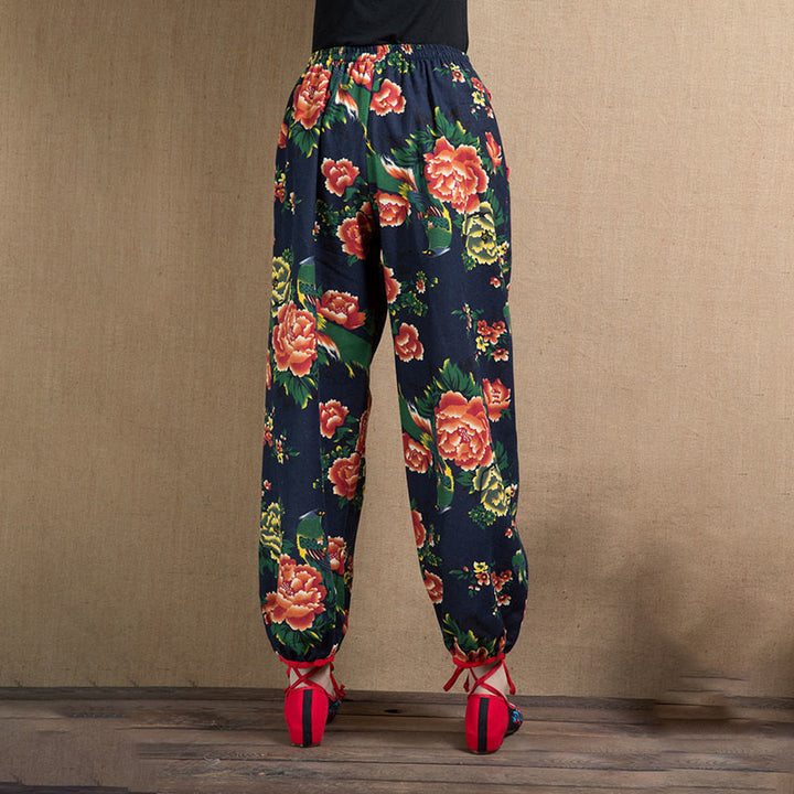 Pantalon sarouel à imprimé fleurs rouges et vertes de style ethnique avec Buddha Stones et poches
