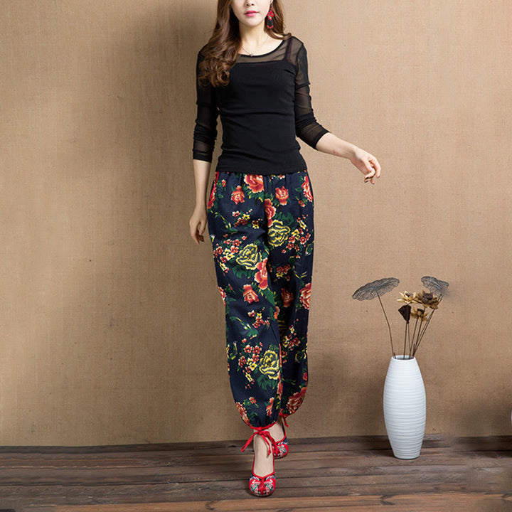 Pantalon sarouel à imprimé fleurs rouges et vertes de style ethnique avec Buddha Stones et poches