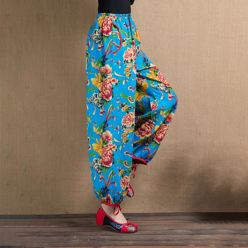 Pantalon sarouel à imprimé fleurs rouges et vertes de style ethnique avec Buddha Stones et poches