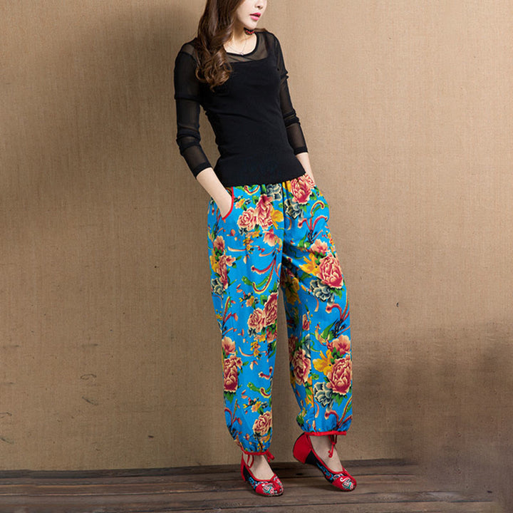 Pantalon sarouel à imprimé fleurs rouges et vertes de style ethnique avec Buddha Stones et poches