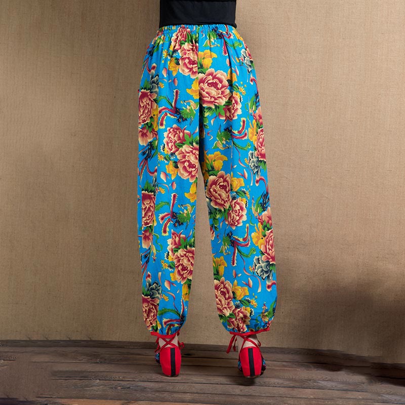 Pantalon sarouel à imprimé fleurs rouges et vertes de style ethnique avec Buddha Stones et poches
