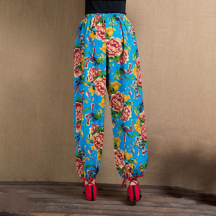 Pantalon sarouel à imprimé fleurs rouges et vertes de style ethnique avec Buddha Stones et poches