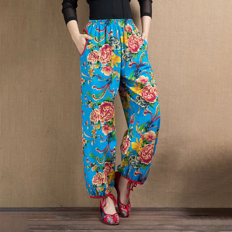 Pantalon sarouel à imprimé fleurs rouges et vertes de style ethnique avec Buddha Stones et poches