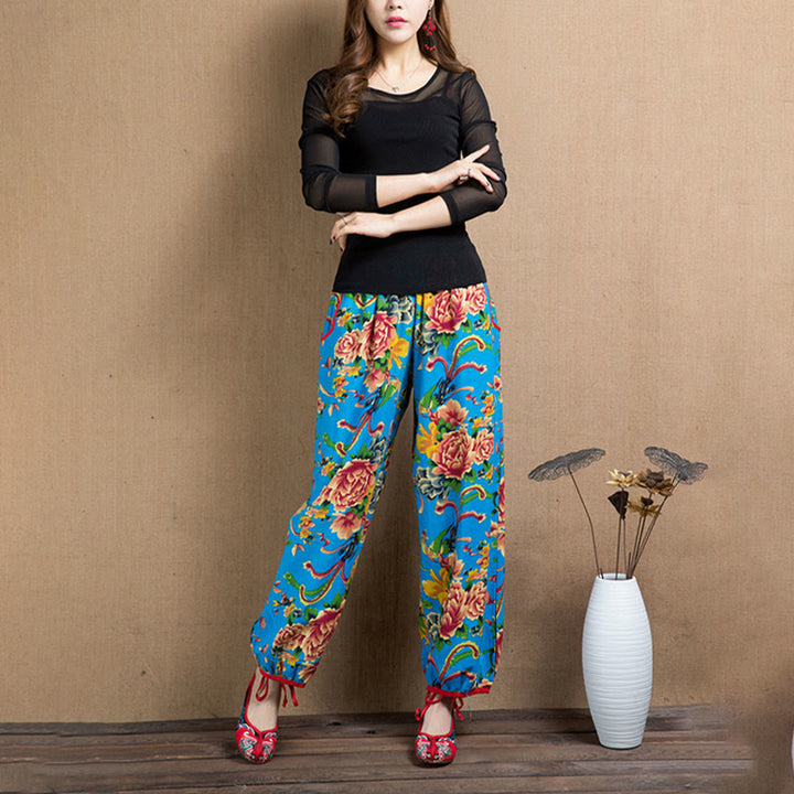 Pantalon sarouel à imprimé fleurs rouges et vertes de style ethnique avec Buddha Stones et poches