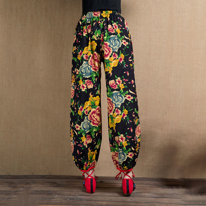 Pantalon sarouel à imprimé fleurs rouges et vertes de style ethnique avec Buddha Stones et poches