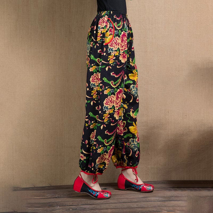 Pantalon sarouel à imprimé fleurs rouges et vertes de style ethnique avec Buddha Stones et poches
